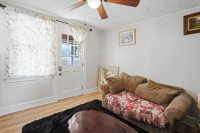 19 Chester St, Fitchburg, MA 01420 - living area with a ceiling fan, crown molding, wood finished floors, and baseboards