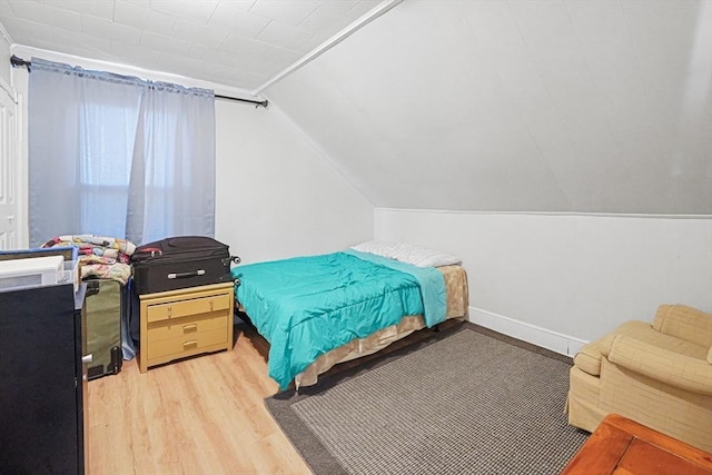 19 Chester St, Fitchburg, MA 01420 - bedroom with light wood-style flooring, vaulted ceiling, and baseboards