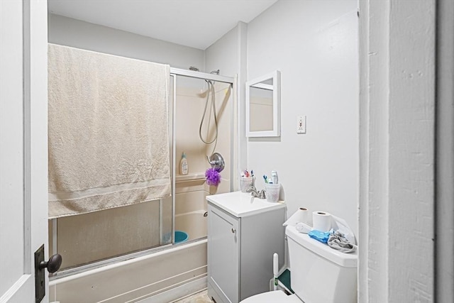 19 Chester St, Fitchburg, MA 01420 - bathroom with vanity, toilet, and combined bath / shower with glass door