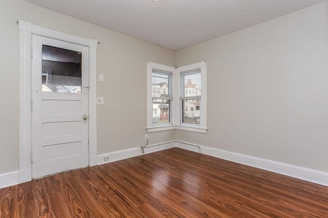 67 Alexander St, Springfield, MA 01107 - foyer featuring baseboards and wood finished floors