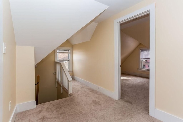 67 Alexander St, Springfield, MA 01107 - hallway featuring an upstairs landing, carpet floors, and vaulted ceiling