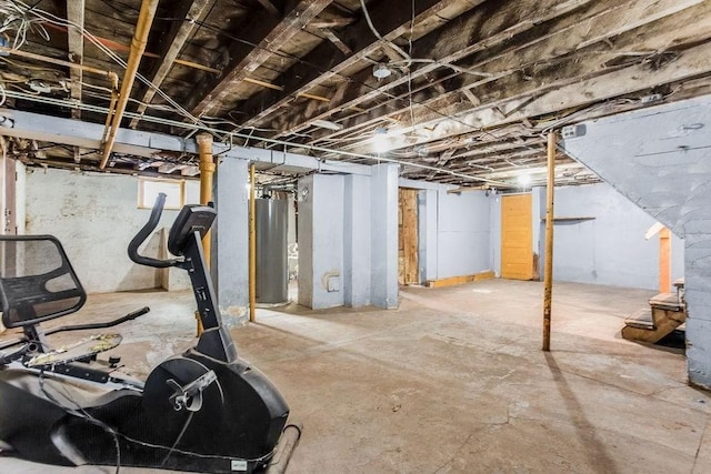 67 Alexander St, Springfield, MA 01107 - unfinished basement featuring water heater