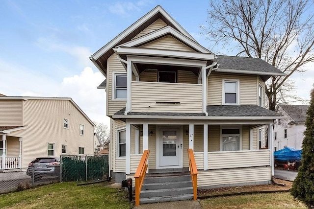 67 Alexander St, Springfield, MA 01107 - view of front facade featuring a porch, a balcony, and a shingled roof