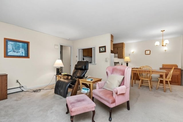 56 Jacqueline Rd Unit 12, Waltham, MA 02452 - living area with light colored carpet, a chandelier, and baseboard heating