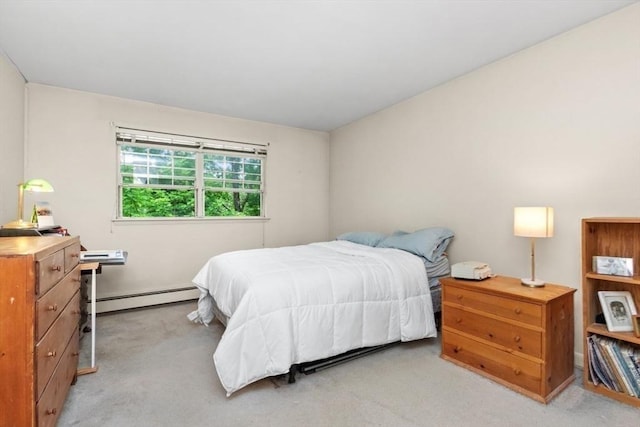 56 Jacqueline Rd Unit 12, Waltham, MA 02452 - bedroom featuring a baseboard heating unit and carpet floors