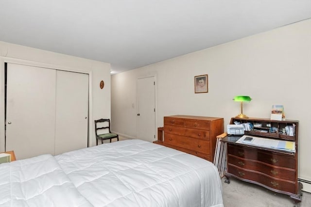 56 Jacqueline Rd Unit 12, Waltham, MA 02452 - bedroom featuring carpet flooring, a closet, and a baseboard radiator