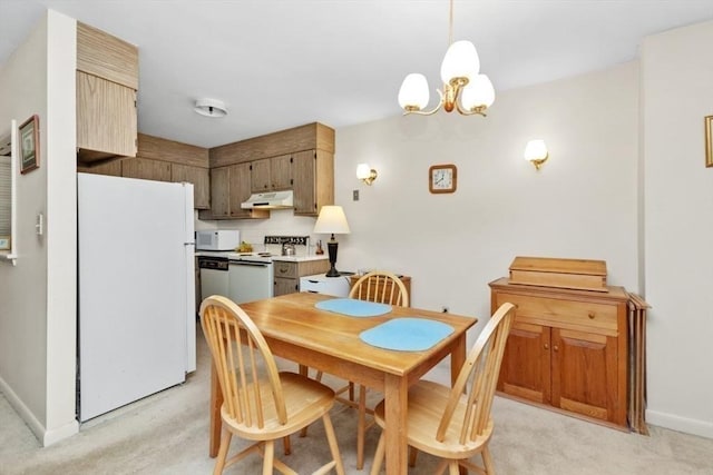 56 Jacqueline Rd Unit 12, Waltham, MA 02452 - dining space featuring light carpet, baseboards, and a chandelier