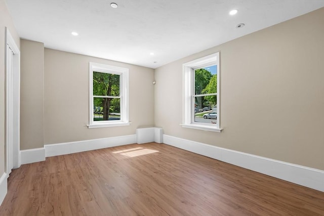 6 Windsor St, Andover, MA 01810 - unfurnished room featuring plenty of natural light, wood finished floors, and recessed lighting