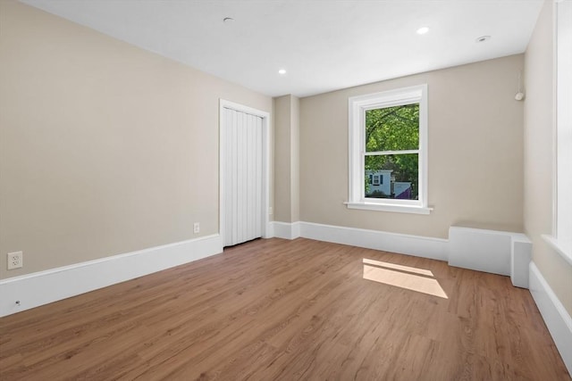 6 Windsor St, Andover, MA 01810 - spare room with wood finished floors and recessed lighting