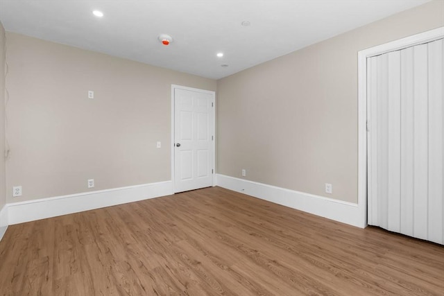 6 Windsor St, Andover, MA 01810 - unfurnished room featuring wood finished floors and recessed lighting