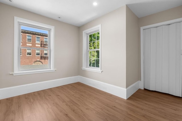 6 Windsor St, Andover, MA 01810 - unfurnished room with wood finished floors and recessed lighting