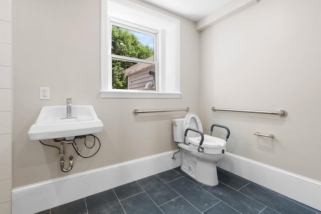 6 Windsor St, Andover, MA 01810 - bathroom featuring toilet and tile patterned floors