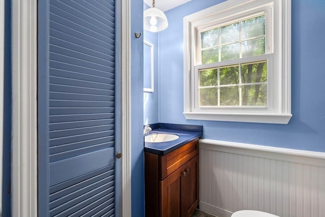 5 Ingalls Rd, Tyngsborough, MA 01879 - half bath featuring a wainscoted wall and vanity
