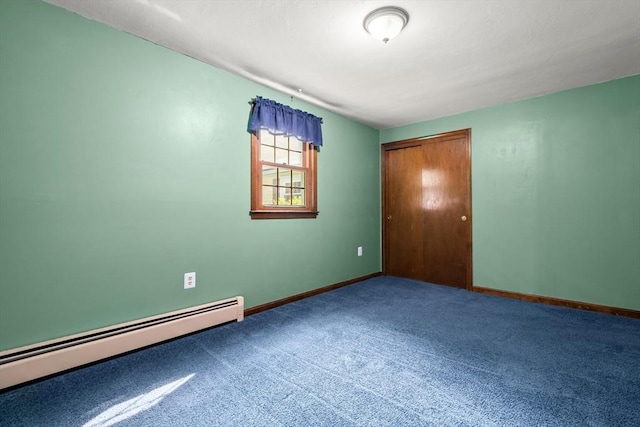 5 Ingalls Rd, Tyngsborough, MA 01879 - unfurnished bedroom with a baseboard heating unit, carpet flooring, and a closet