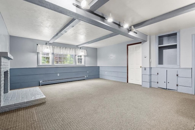 5 Ingalls Rd, Tyngsborough, MA 01879 - unfurnished living room featuring a baseboard radiator, carpet floors, beamed ceiling, a fireplace, and wainscoting