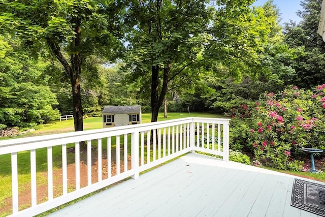 5 Ingalls Rd, Tyngsborough, MA 01879 - wooden terrace featuring a yard, a storage shed, and view of scattered trees