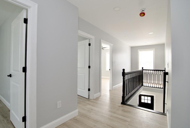 664 Mckinstry Ave, Chicopee, MA 01020 - corridor with an upstairs landing, wood finished floors, and baseboards