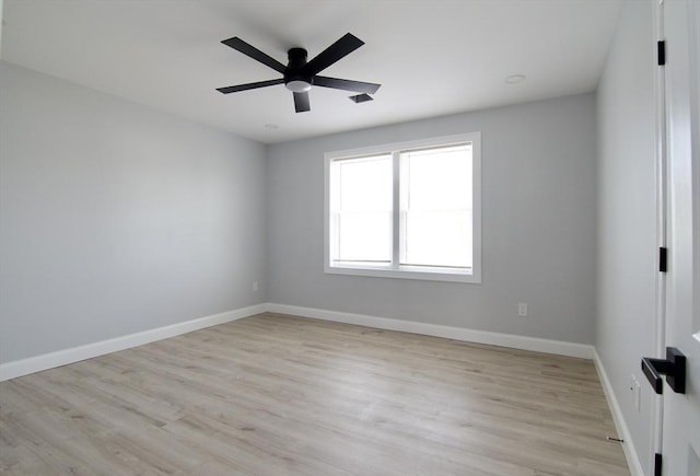 664 Mckinstry Ave, Chicopee, MA 01020 - empty room with light wood-style floors, a ceiling fan, and baseboards