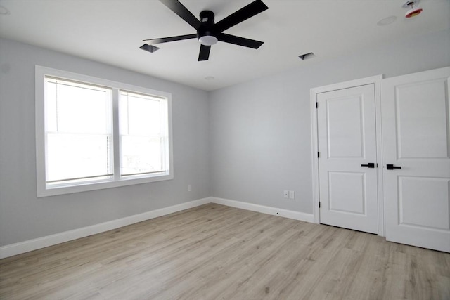 664 Mckinstry Ave, Chicopee, MA 01020 - unfurnished bedroom with light wood finished floors, baseboards, and ceiling fan