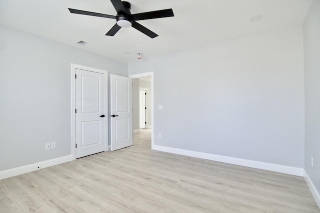 664 Mckinstry Ave, Chicopee, MA 01020 - unfurnished bedroom featuring baseboards, light wood finished floors, ceiling fan, and a closet