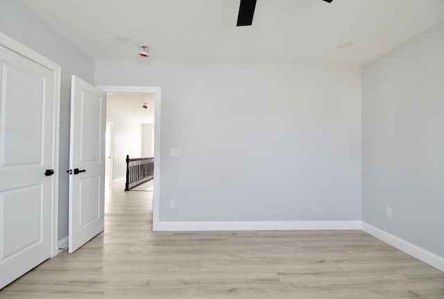 664 Mckinstry Ave, Chicopee, MA 01020 - spare room featuring a ceiling fan, baseboards, and light wood-style flooring
