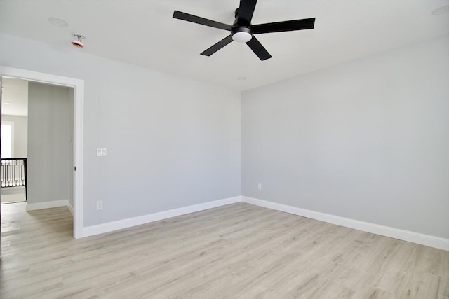 664 Mckinstry Ave, Chicopee, MA 01020 - unfurnished room with light wood finished floors, baseboards, and ceiling fan