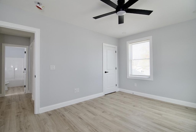 664 Mckinstry Ave, Chicopee, MA 01020 - spare room with light wood-style floors, ceiling fan, and baseboards