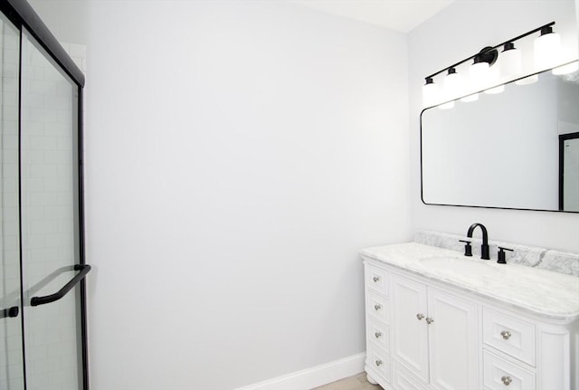 664 Mckinstry Ave, Chicopee, MA 01020 - full bath featuring baseboards, tiled shower, and vanity