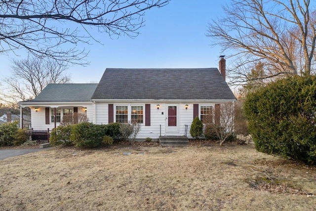 view of front of home with a chimney