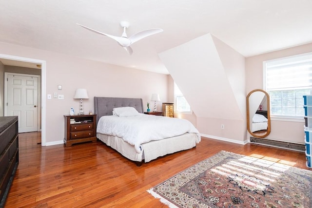 60 Spencer St Unit 60, Millis, MA 02054 - bedroom featuring wood finished floors, multiple windows, baseboards, and ceiling fan