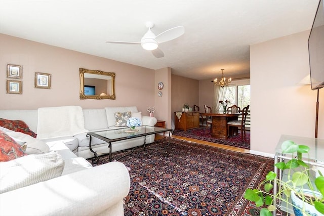 60 Spencer St Unit 60, Millis, MA 02054 - living room with a chandelier, ceiling fan, and baseboards