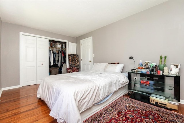 60 Spencer St Unit 60, Millis, MA 02054 - bedroom featuring wood finished floors, baseboards, and a closet