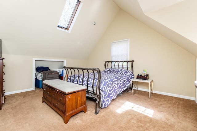 60 Spencer St Unit 60, Millis, MA 02054 - bedroom with light carpet, a skylight, vaulted ceiling, baseboards, and multiple windows
