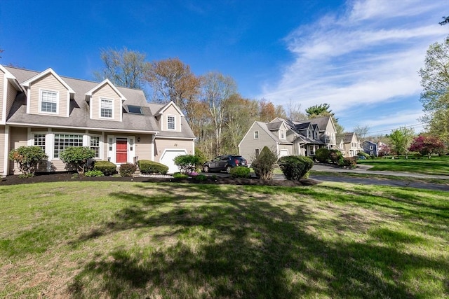 60 Spencer St Unit 60, Millis, MA 02054 - cape cod-style house featuring a residential view, a front lawn, and a garage