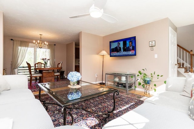 60 Spencer St Unit 60, Millis, MA 02054 - living area featuring stairs, a chandelier, baseboards, and a ceiling fan