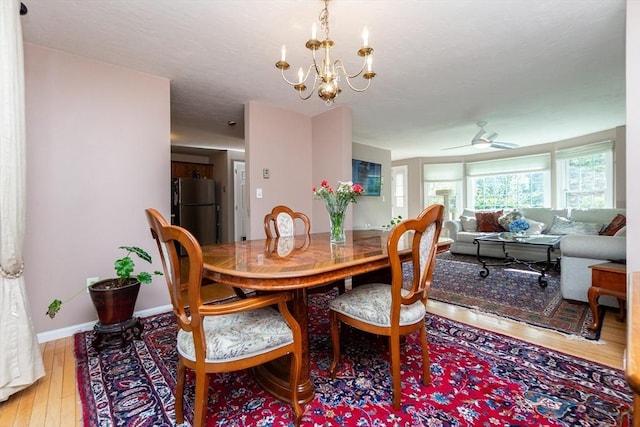60 Spencer St Unit 60, Millis, MA 02054 - dining area featuring wood-type flooring, a chandelier, baseboards, and ceiling fan