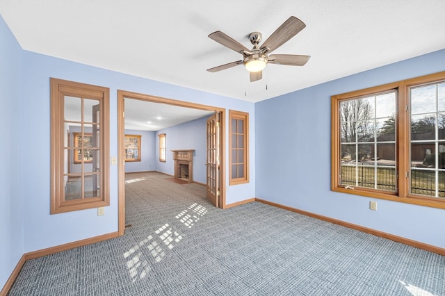 empty room featuring ceiling fan