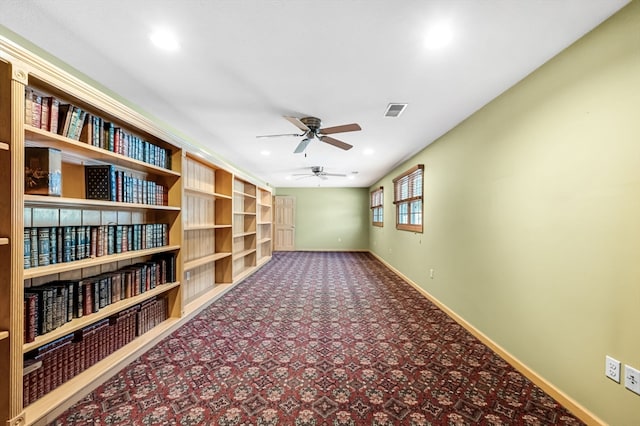 unfurnished room featuring ceiling fan