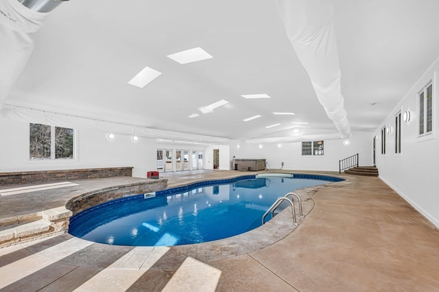 view of pool featuring a jacuzzi