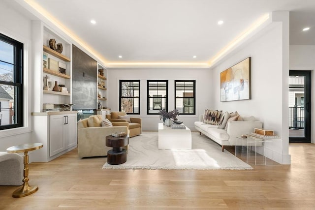 20 Clinton St Unit 22, Newton, MA 02458 - living area featuring light wood-style floors and recessed lighting