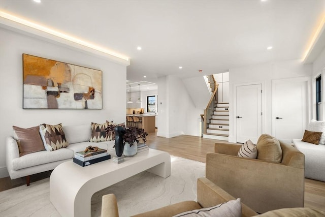 20 Clinton St Unit 22, Newton, MA 02458 - living room with stairway, recessed lighting, and light wood-style floors