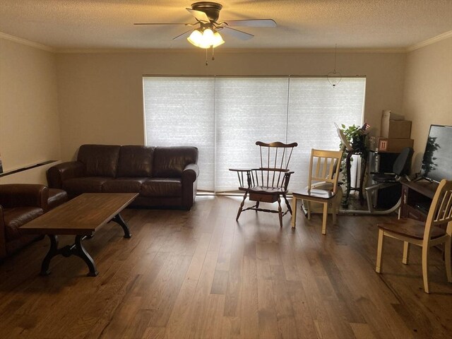 2 Summit Unit 68, Reading, MA 01867 - living area featuring crown molding, wood finished floors, a ceiling fan, and a textured ceiling