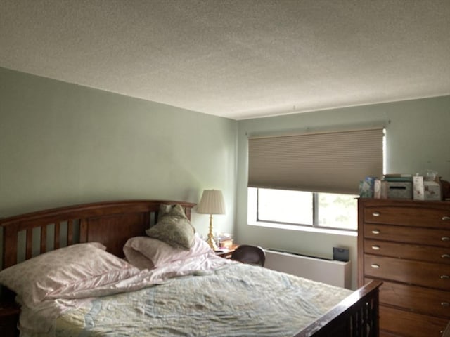 2 Summit Unit 68, Reading, MA 01867 - bedroom with a textured ceiling