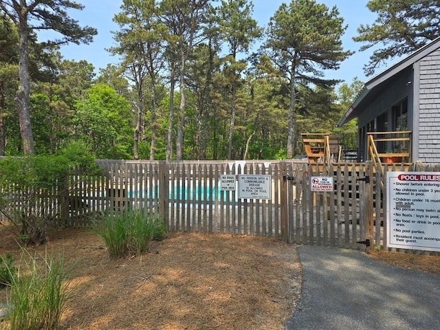 432 Old Chatham Rd Unit 504, Dennis, MA 02660 - view of swimming pool featuring a gate