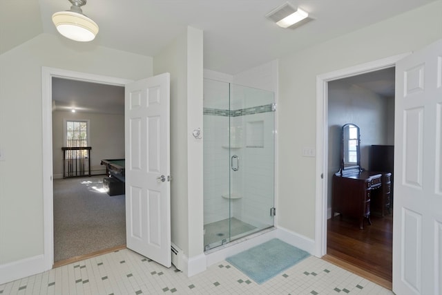 bathroom with tile patterned flooring and an enclosed shower