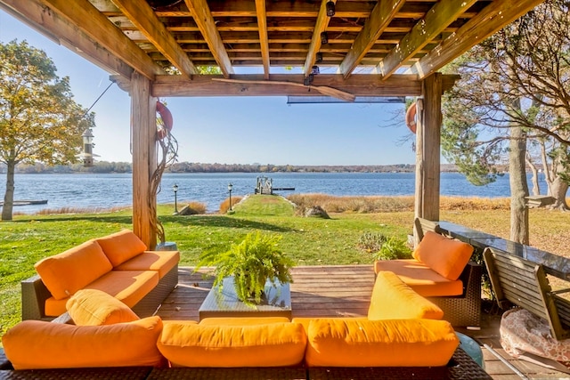 view of patio featuring a water view, a pergola, and an outdoor living space