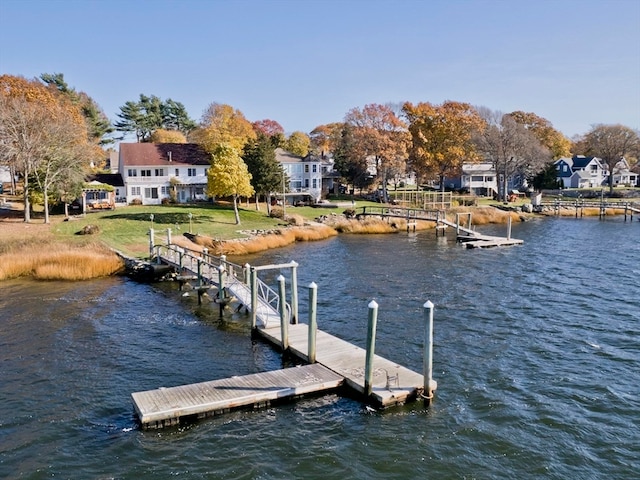 view of dock with a water view