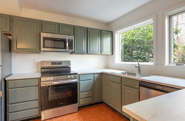 kitchen featuring appliances with stainless steel finishes and sink