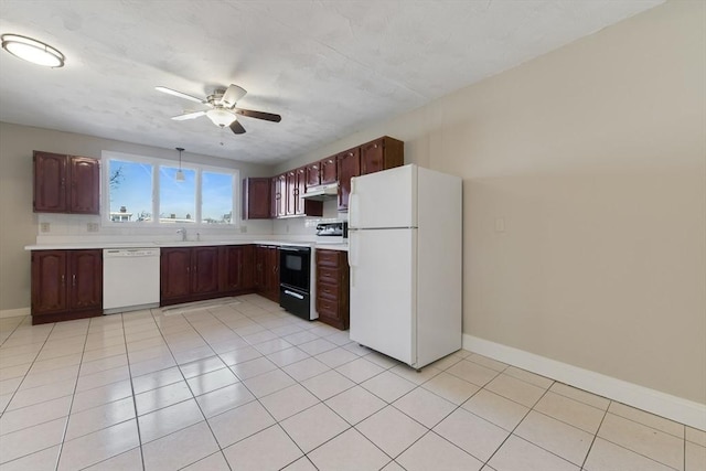 kitchen featuring ceiling fan, white appliances, light tile patterned flooring, and sink