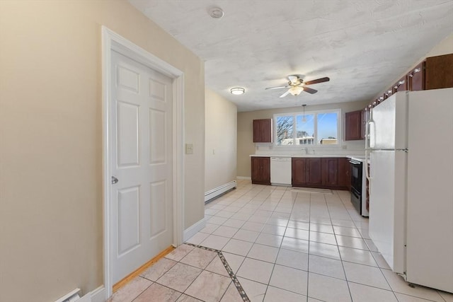 kitchen featuring light tile patterned flooring, a baseboard radiator, white appliances, ceiling fan, and a textured ceiling